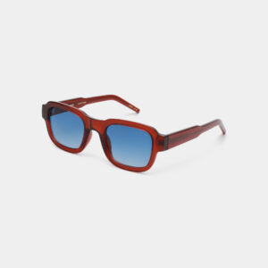 A pair of HALO - Demi blue sunglasses by A. Kjærbede with rectangular red frames and blue-tinted lenses, set at an angle on a plain white background. Gate21.ee