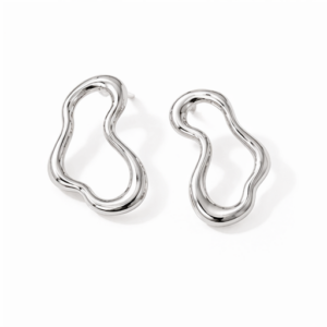 The Aversa - BØLD Earrings in silver feature asymmetrical, abstract shapes with smooth, wavy edges and are displayed on a plain white background. Gate21.ee