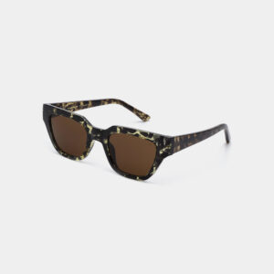 A pair of square-shaped KAWS - Grey transparent sunglasses with dark brown lenses and a grey transparent frame, shown on a plain white background. Gate21.ee