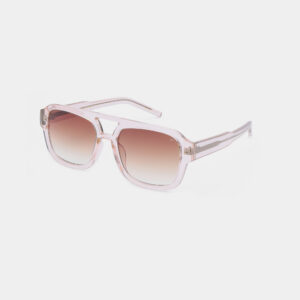 The Kaya - Shadow (Copy) sunglasses by A. Kjærbede feature square-shaped transparent light pink frames and gradient brown lenses, shown on a white background. Gate21.ee