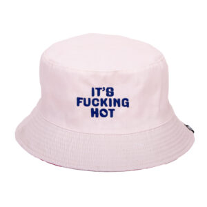 Stay cool with the Reversible Bucket Hat - "It's Fucking Hot", featuring light pink fabric and bold blue embroidered text on the front—perfect for hot summer days. Gate21.ee