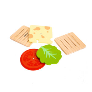 Four wooden coasters from the Burger - Coaster Set are displayed on a white background: two square bread slices, one round red tomato slice, and one green lettuce piece—perfect to pair with the dreamy cat jewellery plate by Hello Ferretti. Gate21.ee