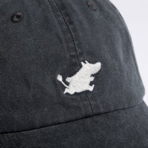 A close-up of the Moomin Cap - Green (Copy) featuring a small white embroidered cartoon character, inspired by Moomin keyrings, centred on the front panel. Gate21.ee