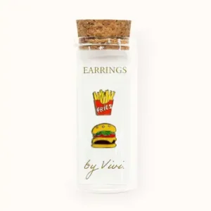 A clear glass vial with a cork lid, labelled “Tennis earrings by Vivi (Copy),” displays illustrated images of tennis-themed earrings on the front. Gate21.ee
