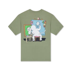 The black Stop Being a Pussy Tee by RIPnDIP features a white cartoon cat on the back, sitting on a stool and painting its self-portrait at an easel, surrounded by photos and drawings pinned to a blue board. Gate21.ee