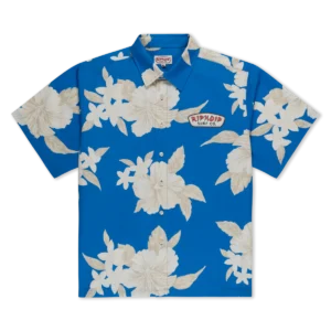 A short-sleeve, button-up blue shirt with large beige and white floral prints and a RipNDip Surf Co. patch on the left chest. Gate21.ee