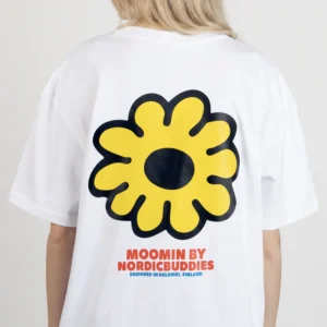 A person wears the Moomin Heavy Ts - Love - White, featuring a large yellow flower and black outline on the back. Below, red and blue text reads: MOOMIN BY NORDICBUDDIES DESIGNED IN HELSINKI, FINLAND. Gate21.ee