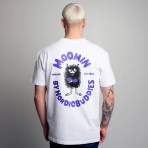 A person with short, light blond hair is seen from behind wearing the Moomin Heavy Ts - Club Life - White (Copy) T-shirt, featuring a black, fuzzy character with a bow tie and “Moomin by Nordicbuddies” in purple text. Gate21.ee