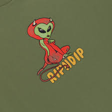 A playful green alien with red horns and tail sits atop a bold yellow "RIPNDIP" logo, echoing the fun, vibrant style of the Nerm Frios Tee - White (Copy), all set against an olive green background. Gate21.ee