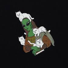 A quirky drawing of an alien-like Mona Lisa with green skin, big black eyes, and five white cats on a plain black background—perfect inspiration for the Sanctum Tee - Black (Copy). Gate21.ee