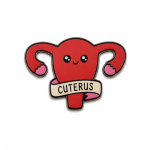 A cartoon illustration of a red womb with a smiling face and a banner that reads CUTERUS decorates the "This is Fine - Pin (Copy)," set against a white background, making it the perfect enamel badge design. Gate21.ee