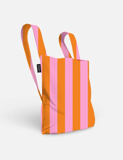 A Playground - Special Edition (Copy) tote bag with vertical orange and pink stripes, featuring matching orange and pink double handles. The bag is displayed against a plain white background. Gate21.ee