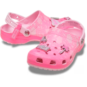 The Crocs Barbie® Classic Clog is a pair of pink Crocs embellished with Barbie-themed charms like a palm tree, a car, and the Barbie logo. These clogs feature ventilated holes, adjustable straps, and a patterned surface. Gate21.ee