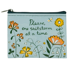 A light blue Beer Money - Recycled Coin Purse made from recycled materials, featuring zip fastener, illustrated yellow and white flowers with green leaves, the phrase “Please, one shitstorm at a time,” and a small butterfly near the upper right. Gate21.ee