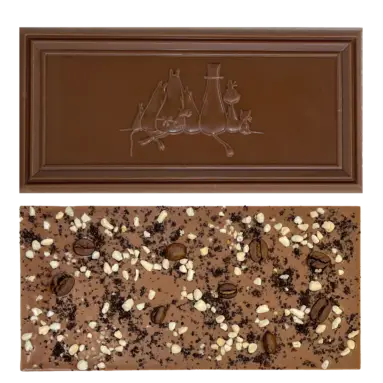 A rectangular Organic Moomin Chocolate Moominpappa – Milk Chocolate 41% with Coffee and Crunchy Caramel bar is shown. One side is embossed with images of cats, whilst the other side is topped with small white and dark pieces, crushed biscuits, and whole coffee beans. The background is plain white. Gate21.ee