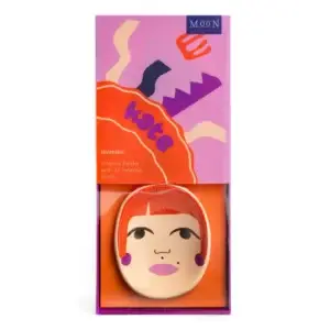 Introducing the Kate Faces - Incense Burner: a boxed incense holder designed as a stylised woman’s face with vibrant red hair, accompanied by 25 lavender incense sticks. The packaging showcases playful, abstract illustrations in purple and orange tones, featuring the name “Kate” on the front—an ideal addition to your Wick & Vessel home fragrance collection. Gate21.ee