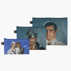 Store your essentials securely and celebrate iconic art with the Tom of Finland 3x Zip Pockets - LOQI Recycled. This set includes three zippered pouches in varying sizes, each made from recycled materials and adorned with detailed Tom of Finland illustrations: a man in a white suit, another in a leather cap and jacket, and two men in sailor hats kissing with birds in the background. Convenient zip fastenings add everyday practicality to this bold tribute to legendary artwork. Gate21.ee